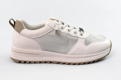 Женские белые кроссовки с сетчатыми вставками на шнурках-резинках сбоку на светлом фоне